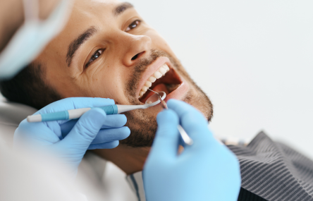 man receiving dental treatment